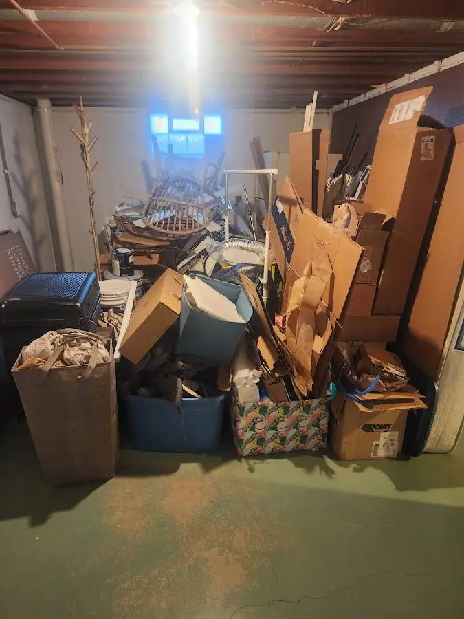 Roll-off dumpster container at job site for 2 Yard Dumpster Rental in Alamo